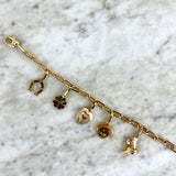 18K Yellow Gold Five Charm Bracelet