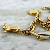 18K Yellow Gold Five Charm Bracelet