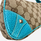 GG Monogram Canvas Nailhead Pochette