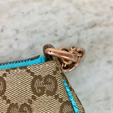 GG Monogram Canvas Nailhead Pochette